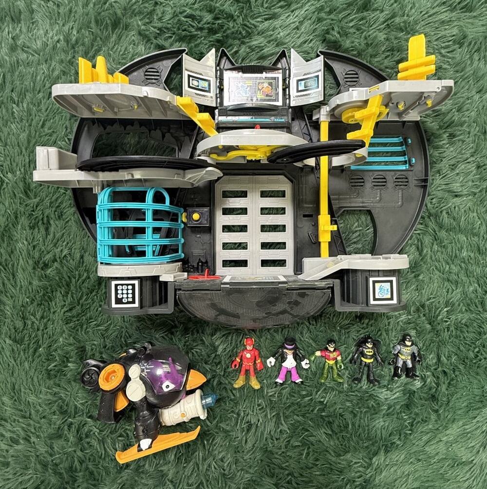 Fisher-Price Imaginext DC Super Friends Batcave Playset & 5 Figures, Penguin Jet